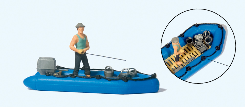 Angler im Schlauchboot, blaues Schlauchboot