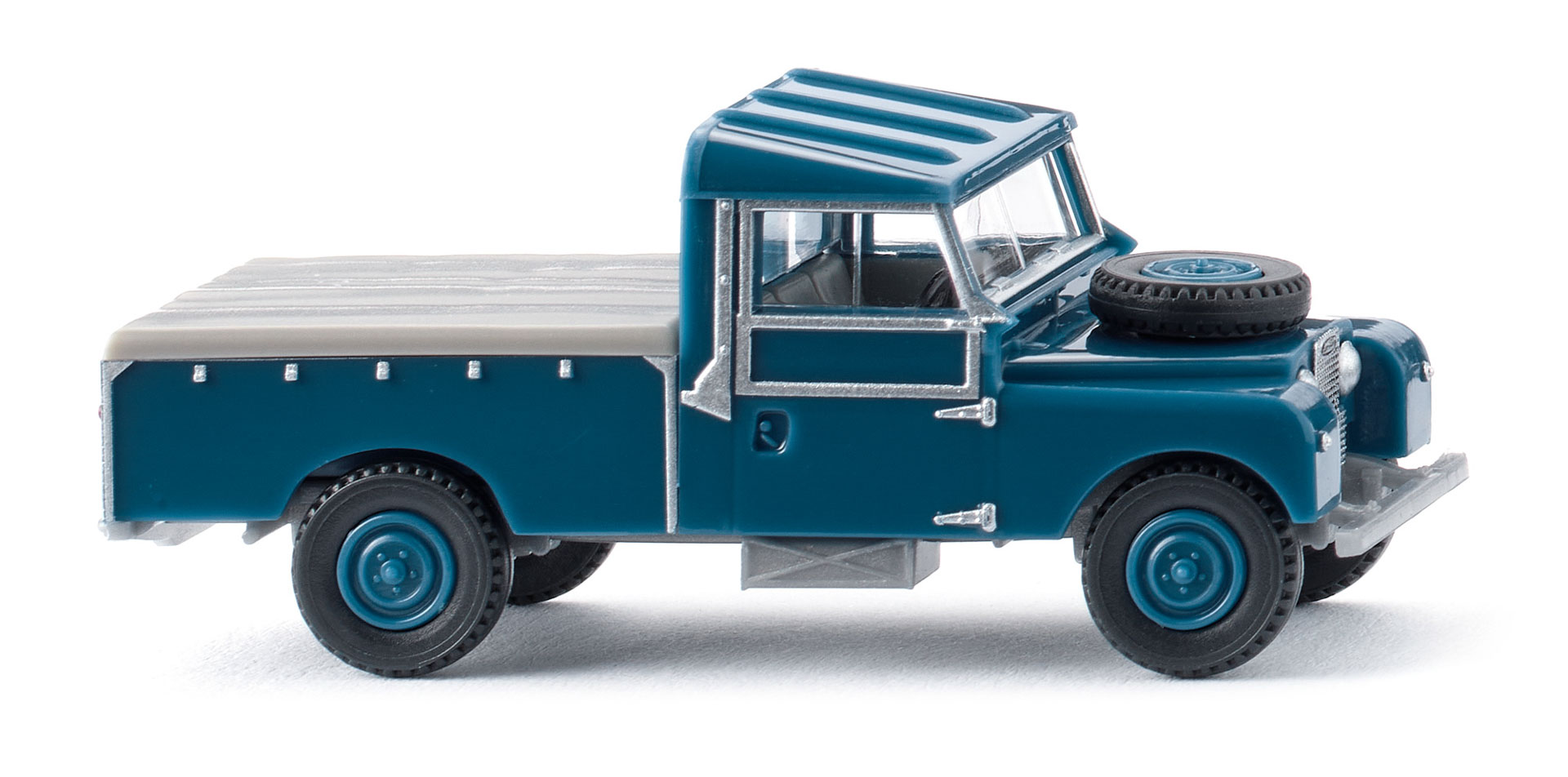 Land Rover Pickup blau mit Plane